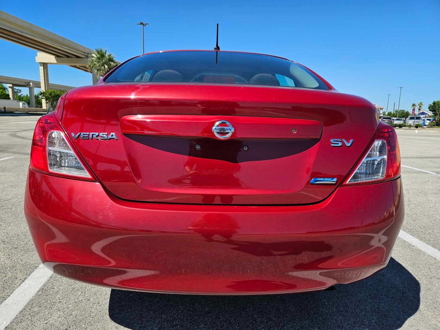 2012 Red /Black Nissan Versa (3N1CN7AP8CL) , located at 5005 Telephone Rd., Houston, TX, 77087, (713) 641-0980, 29.690666, -95.298683 - Photo#4